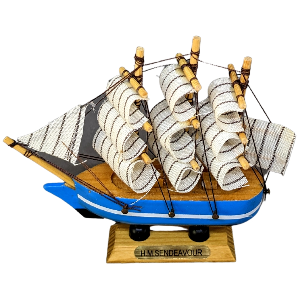 Cute little sail boat miniature made of wood