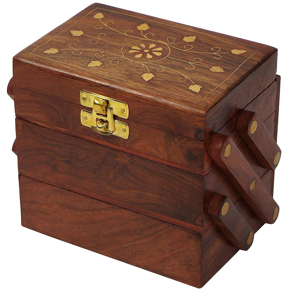 Traditional wooden box with a brass latch on it