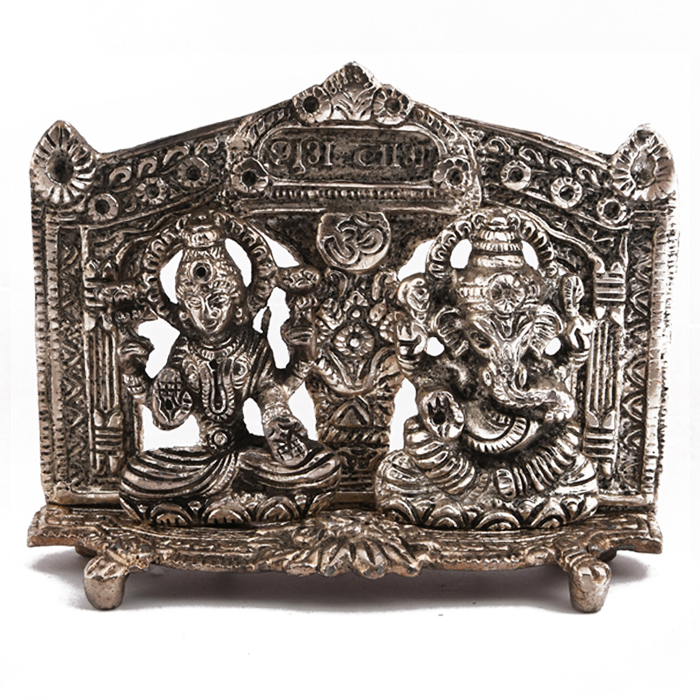Oxidised metal Laxmi and Ganesh figure