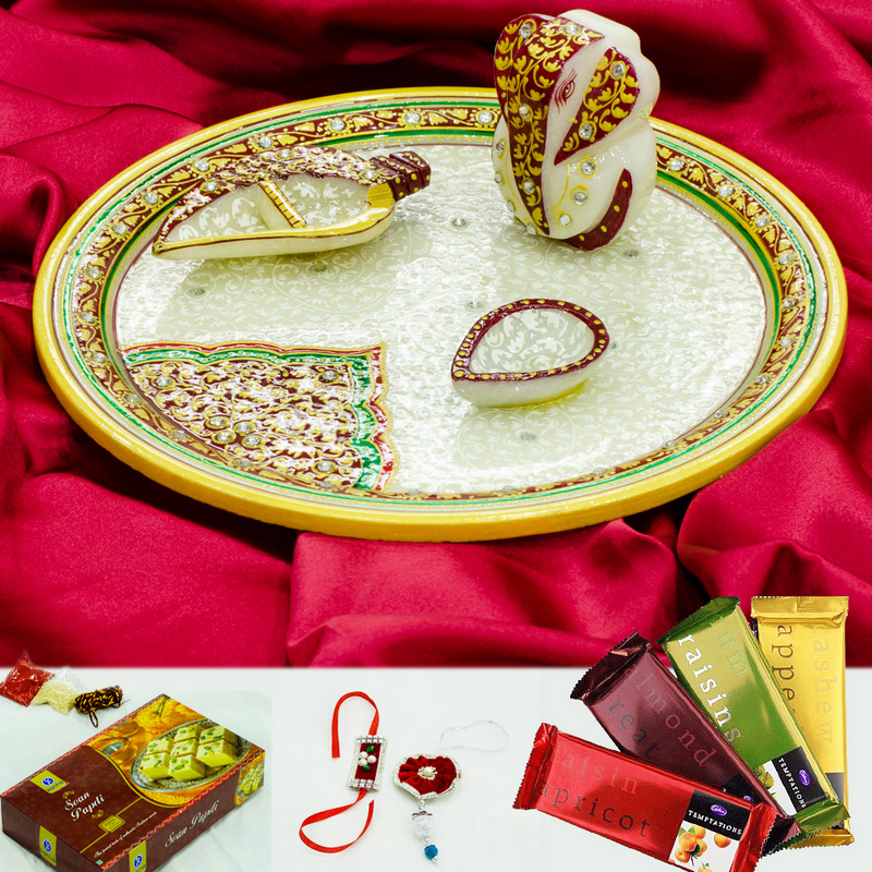 Rakhi online buy with ethnic marble pooja thali, embossed ganesh, sweets and chocolates