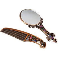 Beautiful pair of metal comb and mirror set