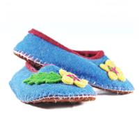 Blue felt slippers with flower embellishments