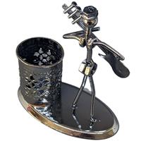 Creative metal pen stand with a guitarist
