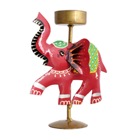 Illuminate with Style: Metal Elephant T-Lite Candle Holder