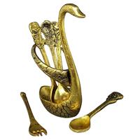 Swan shaped spoon holder with a metal base