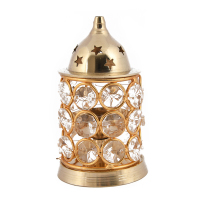 An ethnic crystal akhand jyot with brass finish