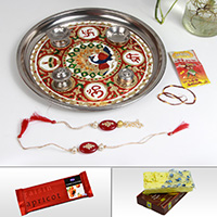 Online rakhi for bhaiya bhabhi with pooja thali, sweets and chocolates