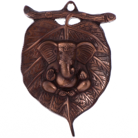 Metal Wall Hanging Of Lord Ganesha On Leaf For A Holy Ambience