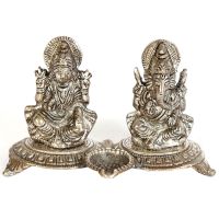 Oxidized Metal Handicrafts Laxmi Ganesh Set As Divine Gift