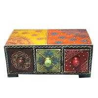 Ethnic chest drawers crafted from wood and ceramic