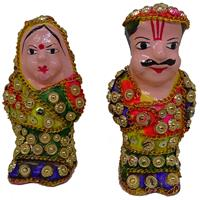 Plaster of Paris made idols of Rajasthani couple with Jaipuri artwork