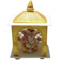 Ganesha idol made of soft marble inside the acrylic temple