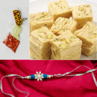 Designer floral rakhi for brother with delicious sweets