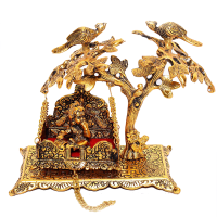 Metallic idol of Lord Kanha on Jhula